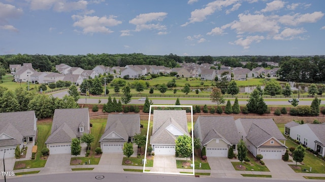 1204 E Rosedale Creek Dr, Durham, NC 27703 - aerial view of residential area featuring property parcel outlined