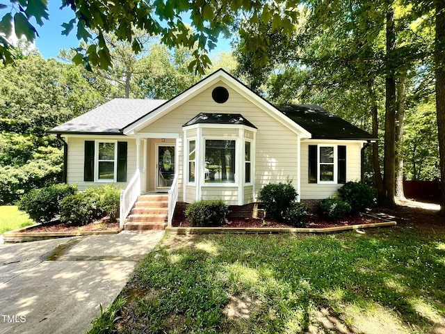 5 Sue Ann Ct, Durham, NC 27704 - view of front facade with roof with shingles