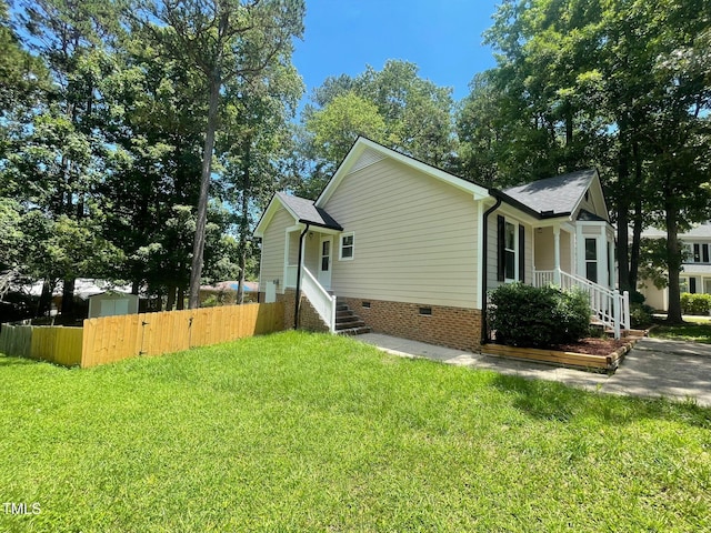 5 Sue Ann Ct, Durham, NC 27704 - view of side of property featuring crawl space and roof with shingles