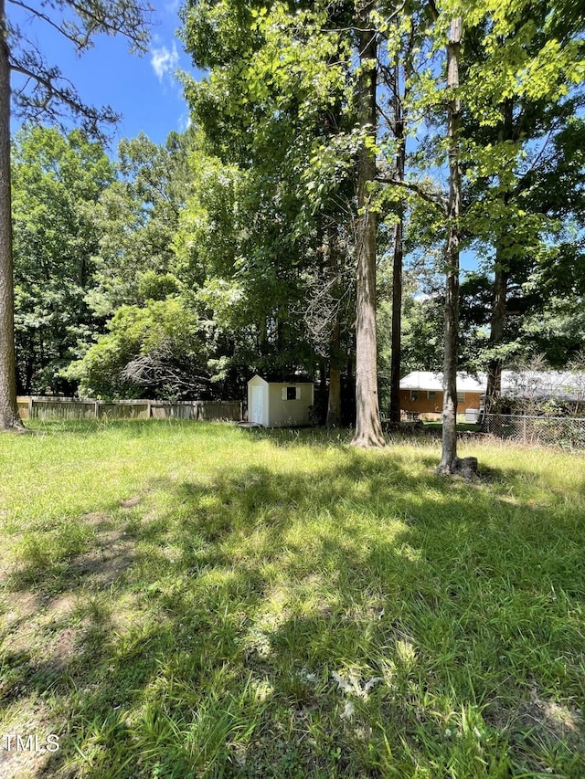 5 Sue Ann Ct, Durham, NC 27704 - view of yard featuring a storage shed