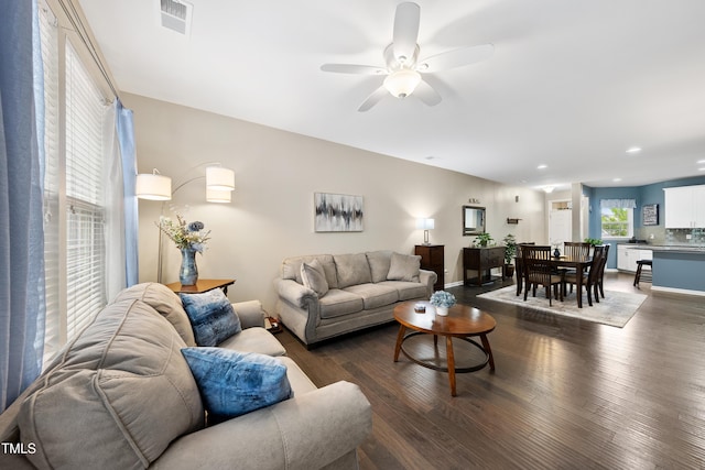 605 Smallwood Dr, Durham, NC 27703 - living room with dark wood finished floors, a ceiling fan, and recessed lighting