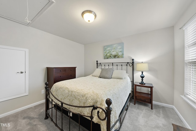 605 Smallwood Dr, Durham, NC 27703 - bedroom featuring attic access and light colored carpet