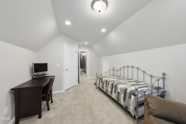 605 Smallwood Dr, Durham, NC 27703 - bedroom featuring vaulted ceiling, light colored carpet, recessed lighting, and an office area