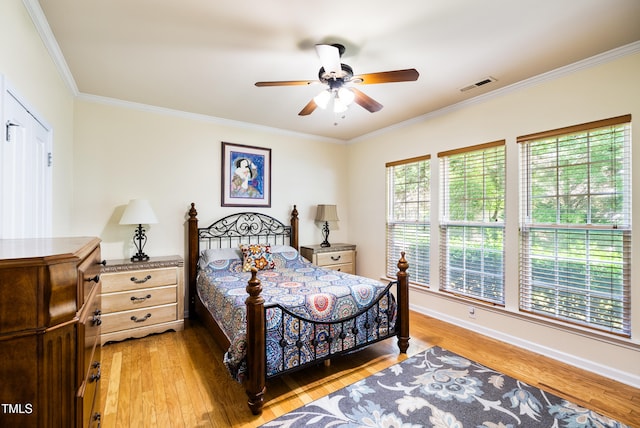 575 Tomkins Loop, Cary, NC 27519 - bedroom featuring light wood-style floors, crown molding, and ceiling fan