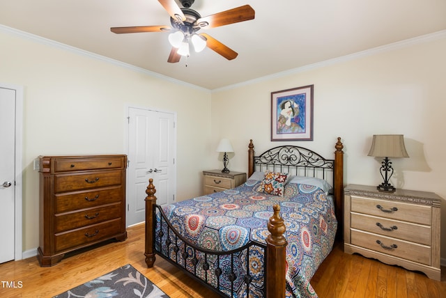 575 Tomkins Loop, Cary, NC 27519 - bedroom featuring ornamental molding, light wood finished floors, and a ceiling fan