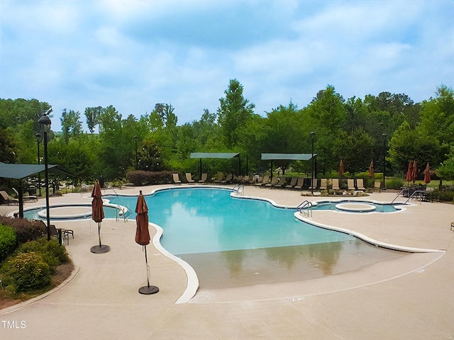 575 Tomkins Loop, Cary, NC 27519 - community pool featuring a patio