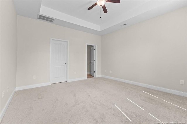 4817 Kiara Dr, Hope Mills, NC 28348 - unfurnished room with a ceiling fan, carpet floors, and a raised ceiling