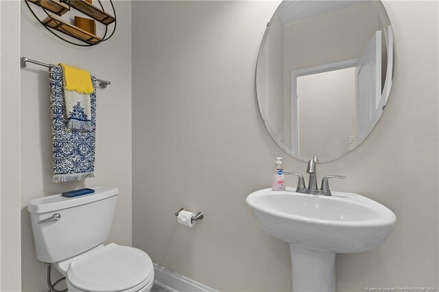 4817 Kiara Dr, Hope Mills, NC 28348 - bathroom with toilet and a sink