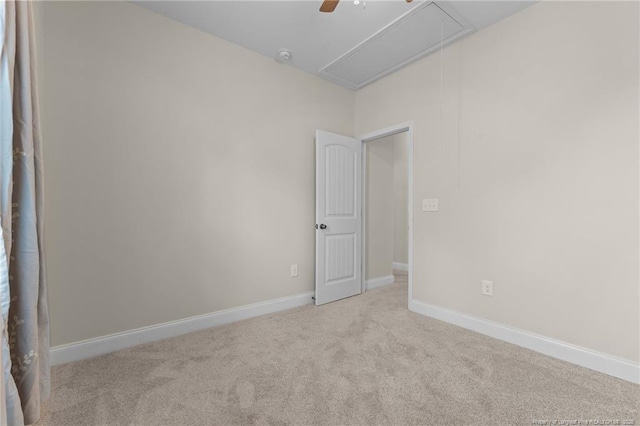 4817 Kiara Dr, Hope Mills, NC 28348 - empty room with attic access, light carpet, and a ceiling fan