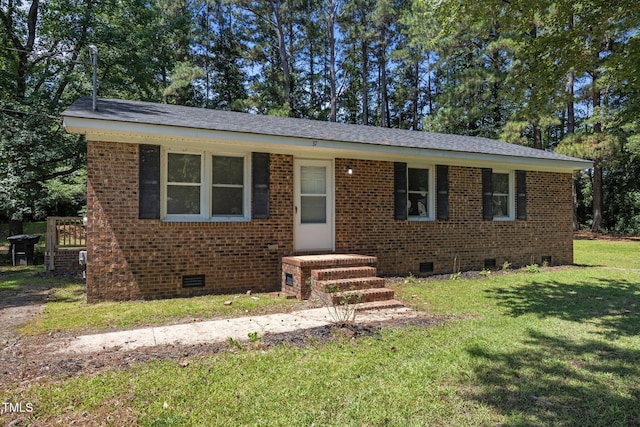 37 Weeping Willow Ln, Lillington, NC 27546 - view of front facade with crawl space, a front lawn, and brick siding