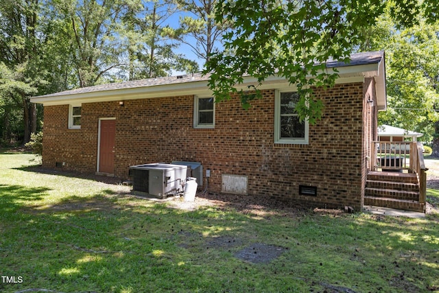 37 Weeping Willow Ln, Lillington, NC 27546 - view of side of home with crawl space, a lawn, and brick siding