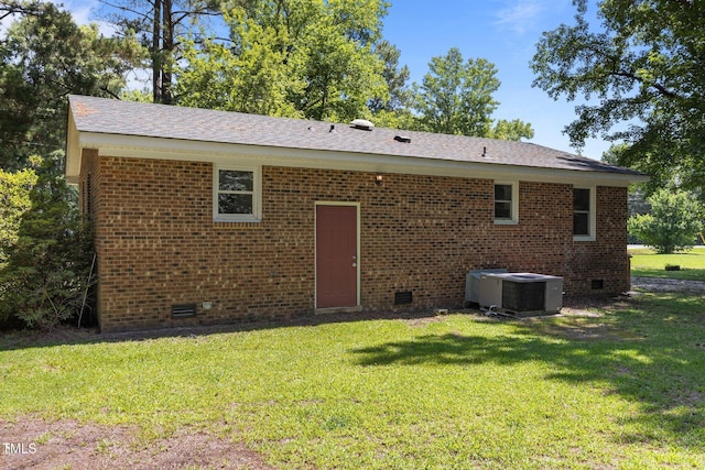 37 Weeping Willow Ln, Lillington, NC 27546 - back of house with crawl space, a lawn, brick siding, and a shingled roof