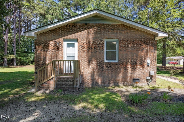 37 Weeping Willow Ln, Lillington, NC 27546 - view of home's exterior with a lawn, brick siding, and crawl space