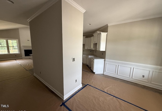 2760 Rains Mill Rd, Princeton, NC 27569 - corridor featuring ornamental molding, carpet flooring, and wainscoting