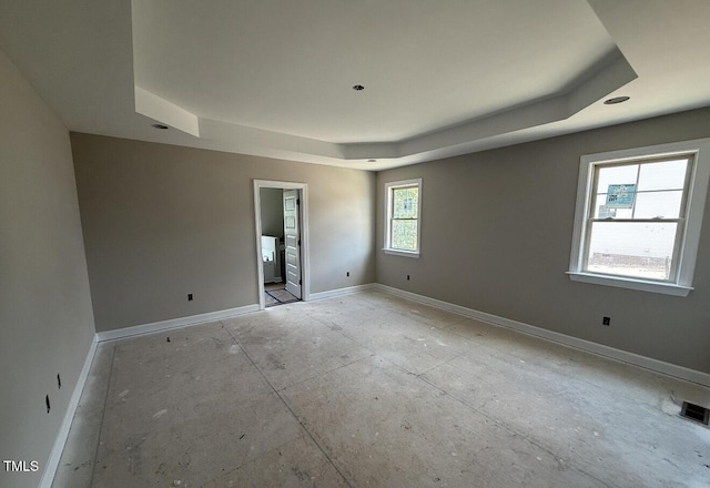 2760 Rains Mill Rd, Princeton, NC 27569 - spare room featuring a raised ceiling and baseboards