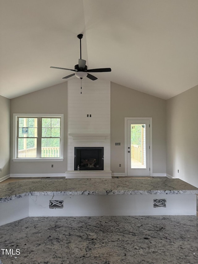 2760 Rains Mill Rd, Princeton, NC 27569 - unfurnished living room with ceiling fan, lofted ceiling, and a fireplace