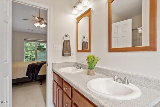 161 Jacob St, Holly Springs, NC 27540 - bathroom with double vanity, ceiling fan, and connected bathroom