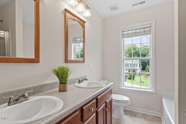 161 Jacob St, Holly Springs, NC 27540 - full bath featuring double vanity, a tub to relax in, a shower, and tile patterned floors