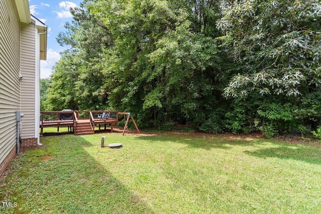 161 Jacob St, Holly Springs, NC 27540 - view of grassy yard with a deck