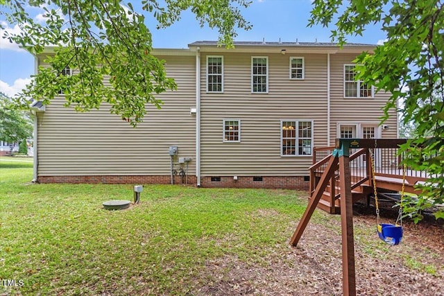 161 Jacob St, Holly Springs, NC 27540 - back of property featuring crawl space, a lawn, and a deck