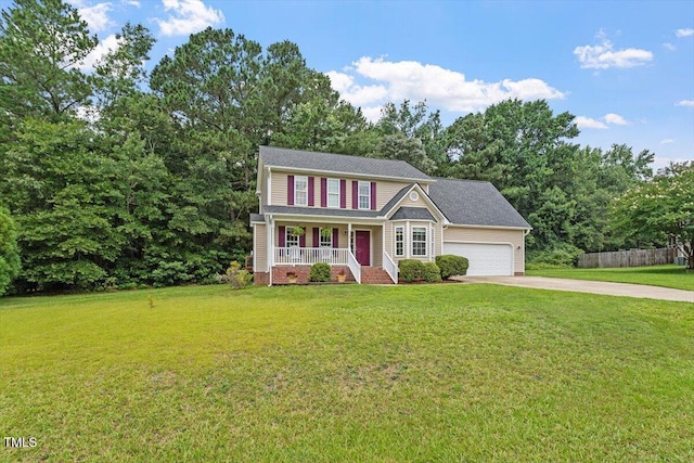 161 Jacob St, Holly Springs, NC 27540 - view of front of property with a porch, concrete driveway, and an attached garage