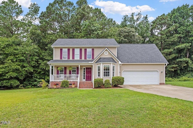161 Jacob St, Holly Springs, NC 27540 - view of front facade featuring covered porch, concrete driveway, a garage, and a front yard