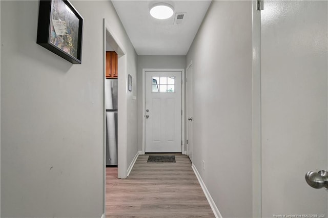 6501 Senator Dr, Fayetteville, NC 28304 - entryway featuring light wood-style floors and baseboards