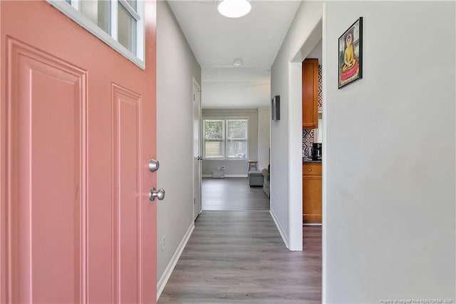 6501 Senator Dr, Fayetteville, NC 28304 - hallway featuring light wood-type flooring and baseboards