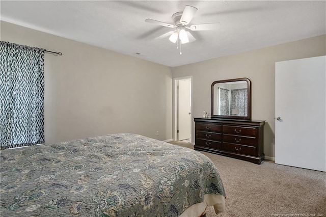 6501 Senator Dr, Fayetteville, NC 28304 - carpeted bedroom with a ceiling fan
