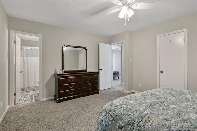 6501 Senator Dr, Fayetteville, NC 28304 - bedroom with carpet floors, ceiling fan, and connected bathroom