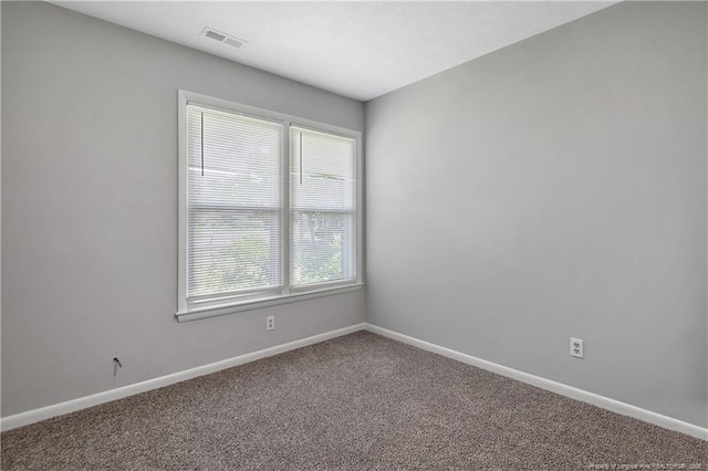 6501 Senator Dr, Fayetteville, NC 28304 - carpeted empty room featuring baseboards