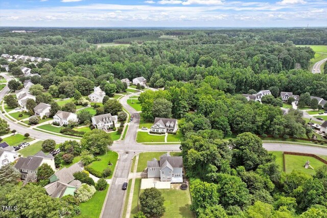 1505 Mclaurin Ln, Fuquay Varina, NC 27526 - aerial perspective of suburban area featuring a forest