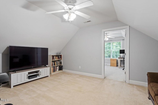1505 Mclaurin Ln, Fuquay Varina, NC 27526 - unfurnished living room with light carpet, vaulted ceiling, and a ceiling fan