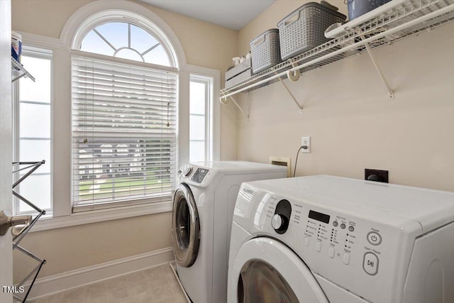 1505 Mclaurin Ln, Fuquay Varina, NC 27526 - washroom with washer and dryer and healthy amount of natural light