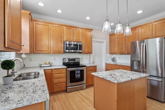 1505 Mclaurin Ln, Fuquay Varina, NC 27526 - kitchen featuring appliances with stainless steel finishes, a kitchen island, backsplash, light stone counters, and light wood-style flooring