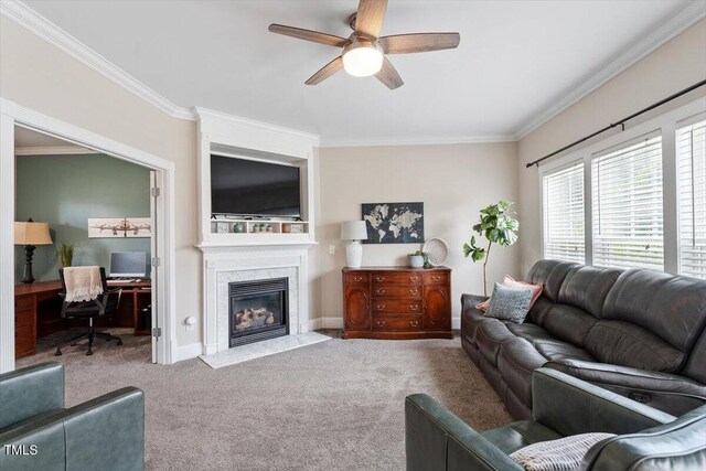 1505 Mclaurin Ln, Fuquay Varina, NC 27526 - carpeted living area featuring ornamental molding, a ceiling fan, a fireplace with flush hearth, and a desk