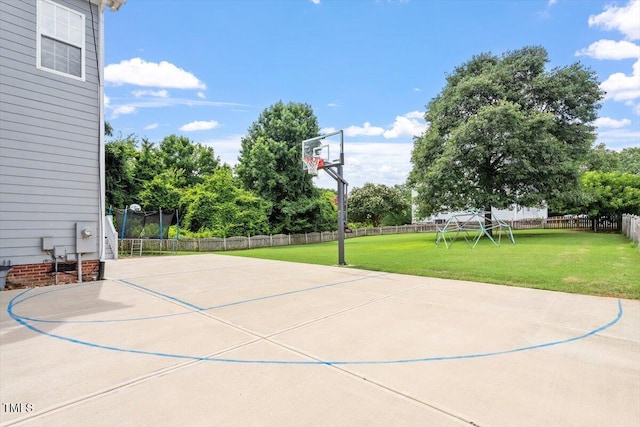1505 Mclaurin Ln, Fuquay Varina, NC 27526 - view of sport court featuring basketball hoop and view of wooded area