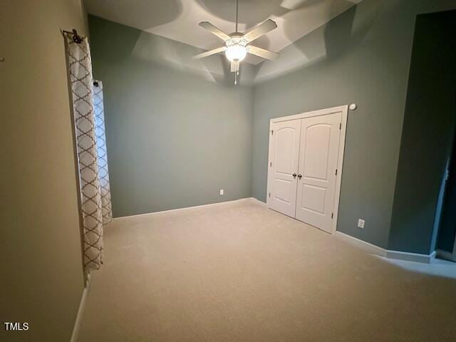 1113 Bexley Hills Bnd, Apex, NC 27502 - unfurnished bedroom featuring carpet, ceiling fan, and a closet