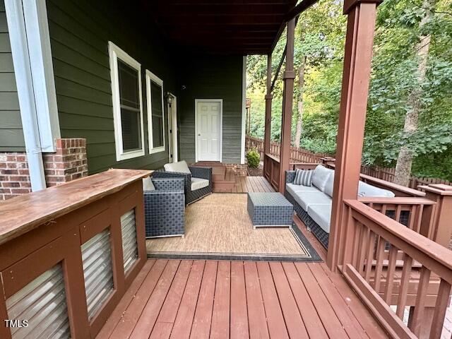 1113 Bexley Hills Bnd, Apex, NC 27502 - wooden terrace featuring an outdoor living space