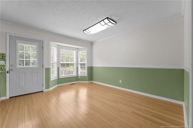 159 Falling Leaf Dr, Raeford, NC 28376 - foyer featuring crown molding and light wood-style flooring