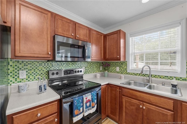 159 Falling Leaf Dr, Raeford, NC 28376 - kitchen featuring appliances with stainless steel finishes, light countertops, ornamental molding, tasteful backsplash, and brown cabinets