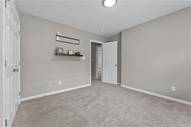 159 Falling Leaf Dr, Raeford, NC 28376 - unfurnished bedroom with carpet and baseboards
