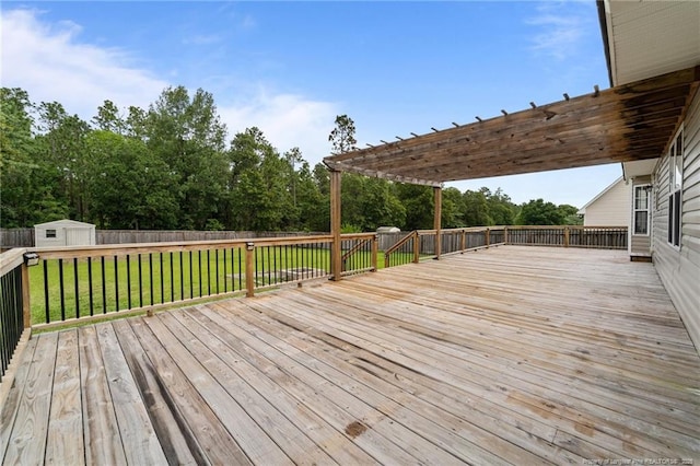 159 Falling Leaf Dr, Raeford, NC 28376 - wooden terrace with a shed, a pergola, a fenced backyard, and view of wooded area