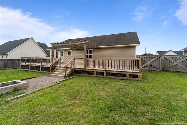 159 Falling Leaf Dr, Raeford, NC 28376 - back of property featuring a fenced backyard, a wooden deck, and a pergola