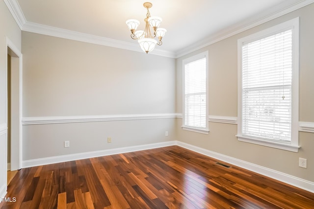 165 Sutherland Dr, Franklinton, NC 27525 - spare room with a chandelier, dark wood finished floors, and ornamental molding