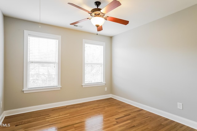 165 Sutherland Dr, Franklinton, NC 27525 - unfurnished room with light wood finished floors, healthy amount of natural light, and a ceiling fan