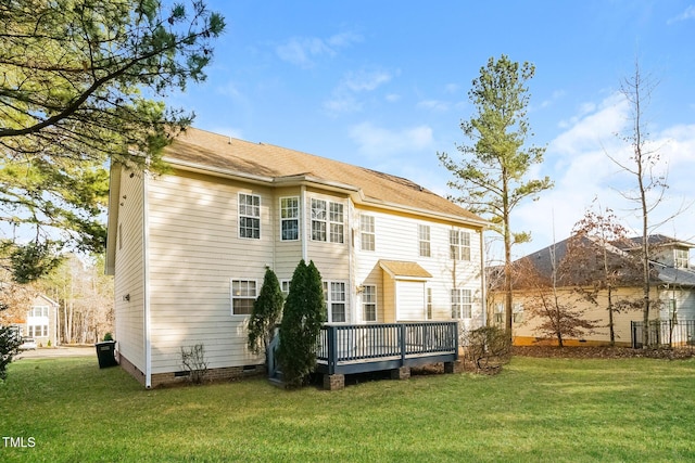 165 Sutherland Dr, Franklinton, NC 27525 - back of property with crawl space, a wooden deck, and a lawn