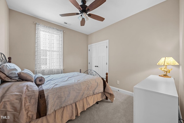 80 Scarlet Bell Dr, Youngsville, NC 27596 - bedroom featuring light carpet and ceiling fan