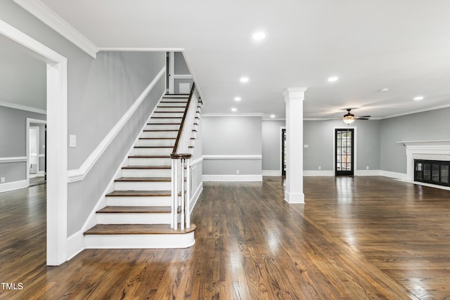 1112 Lakeside Dr NW, Wilson, NC 27896 - staircase featuring a ceiling fan, ornate columns, wood finished floors, recessed lighting, and ornamental molding