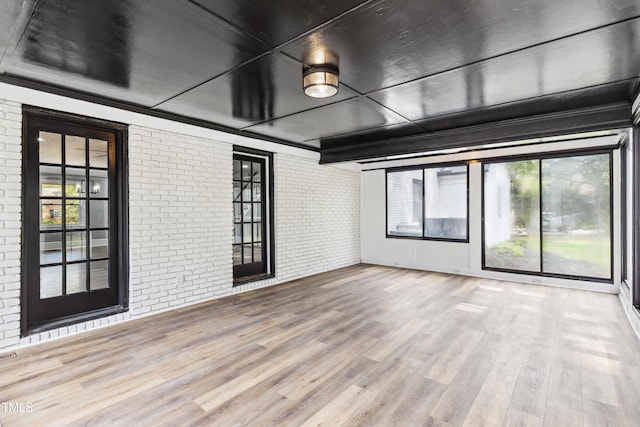 1112 Lakeside Dr NW, Wilson, NC 27896 - unfurnished sunroom featuring plenty of natural light